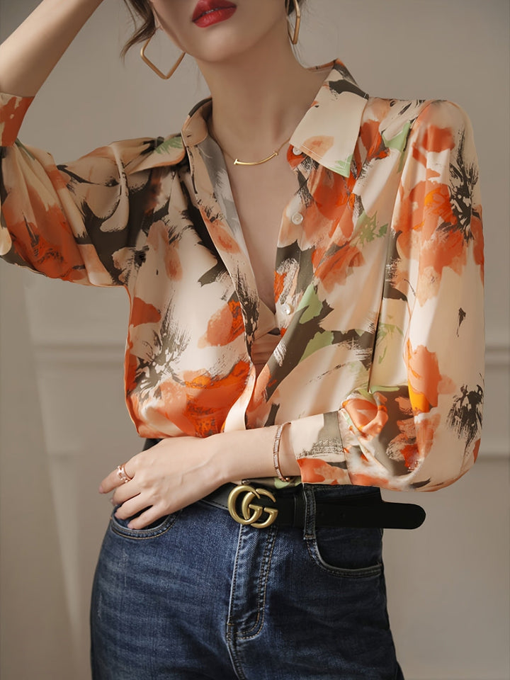 Women's elegant floral ink print blouse. Versatile long-sleeve top for smart casual & spring fashion.