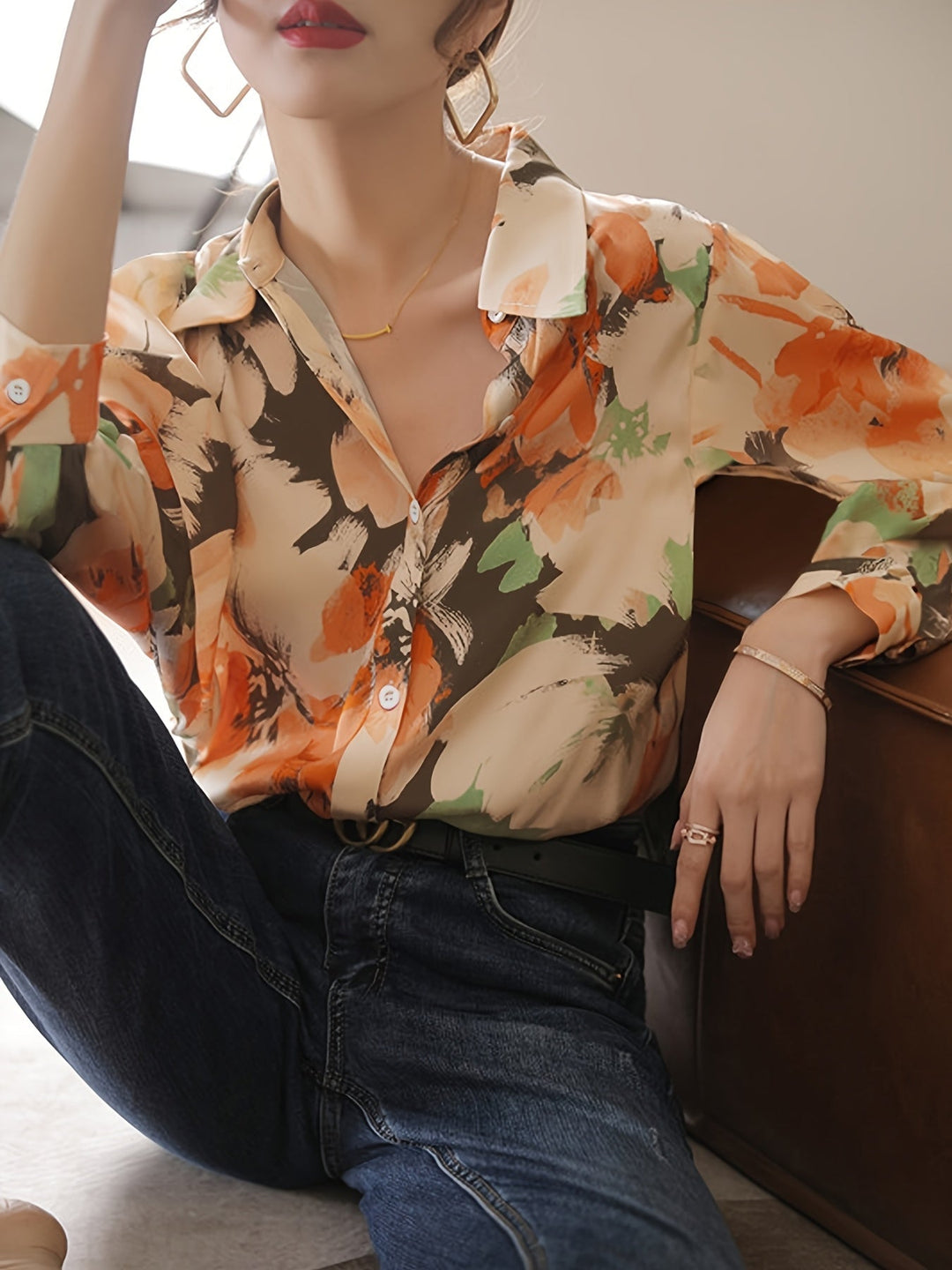 Stylish women's floral ink print blouse. Comfortable long-sleeve top, perfect for spring, summer & autumn wear.