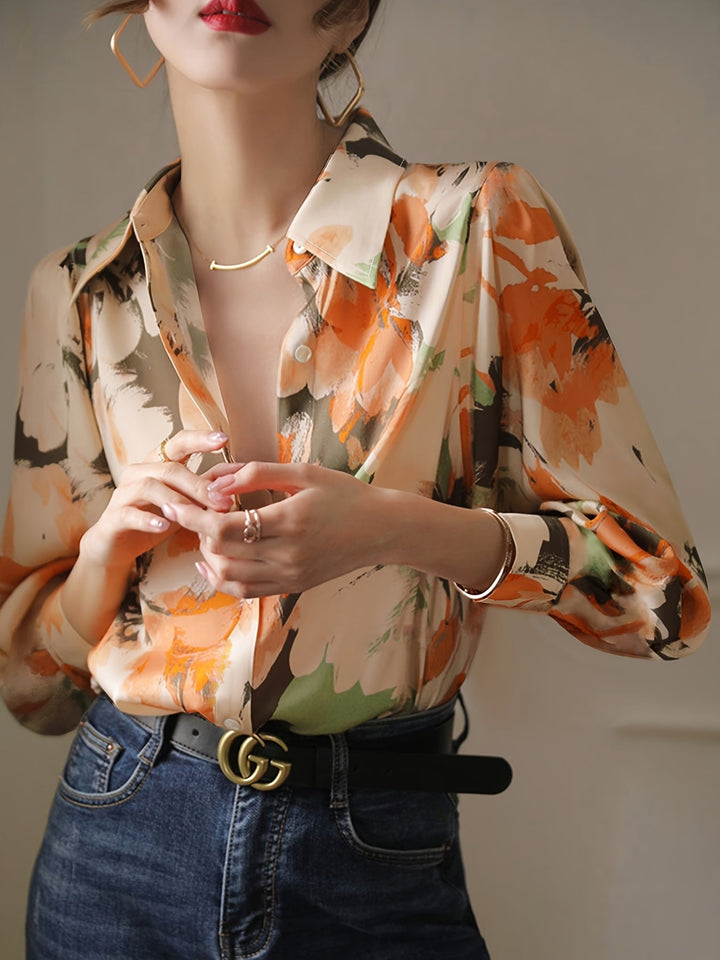 Elegant women's blouse with unique floral ink print. Comfortable fit, versatile for smart casual and seasonal fashion.