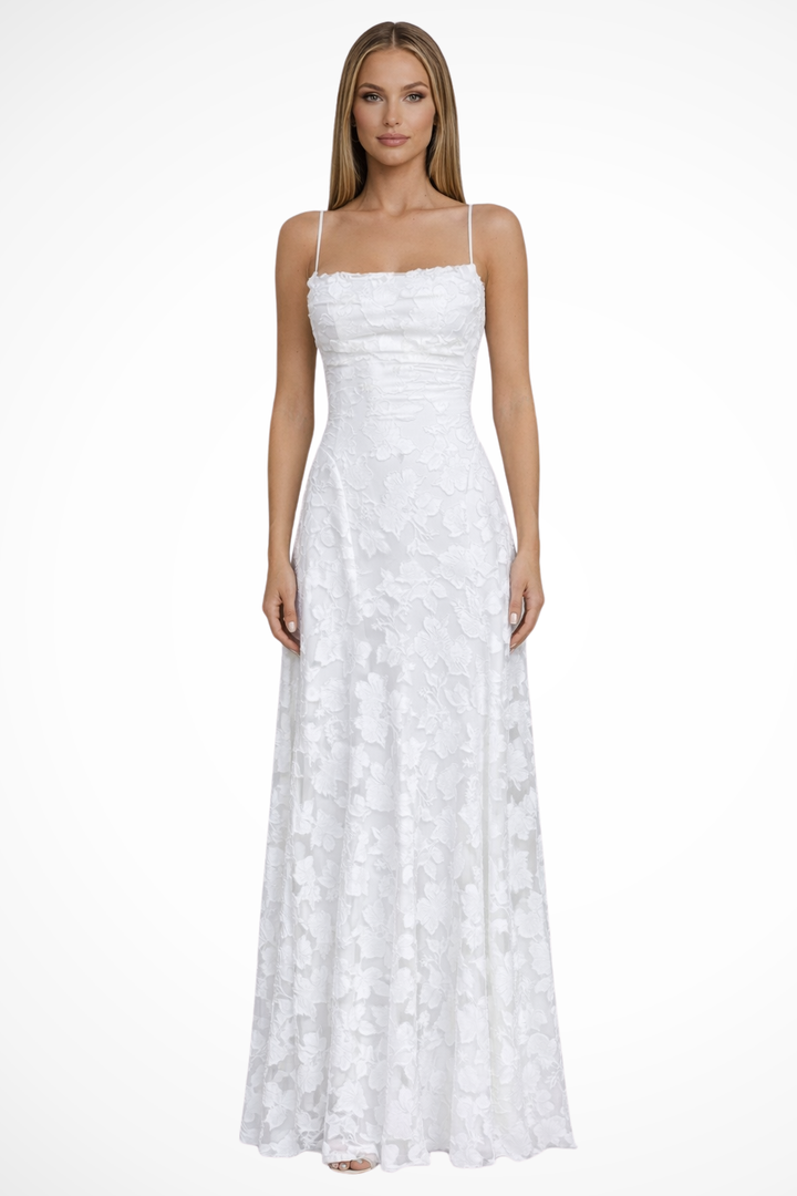 Front view of women's floral jacquard maxi dress with delicate spaghetti straps. Ideal for parties & special occasions.
