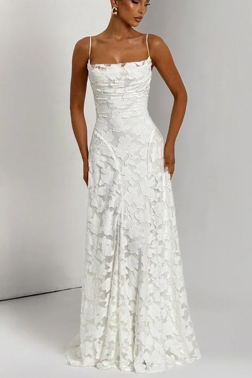 Sleeveless floral jacquard maxi dress for women, featuring a sophisticated lace-up back and elegant formal design.