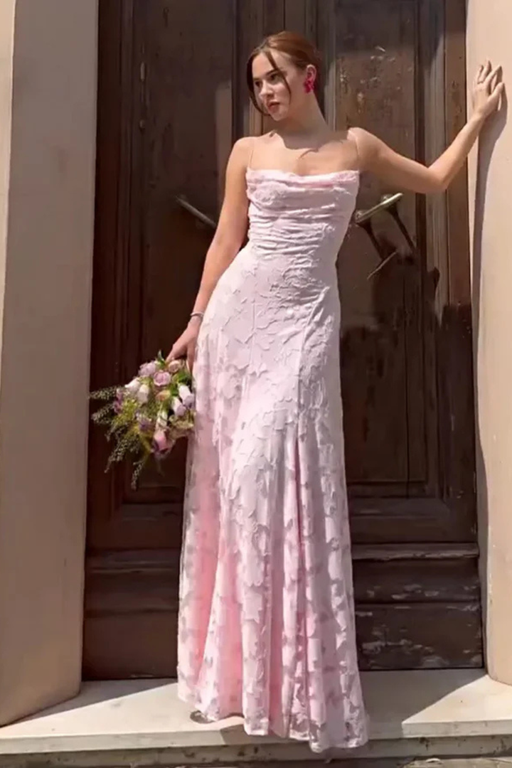 Women's sleeveless floral jacquard maxi dress. Elegant design with spaghetti straps and a lace-up back.