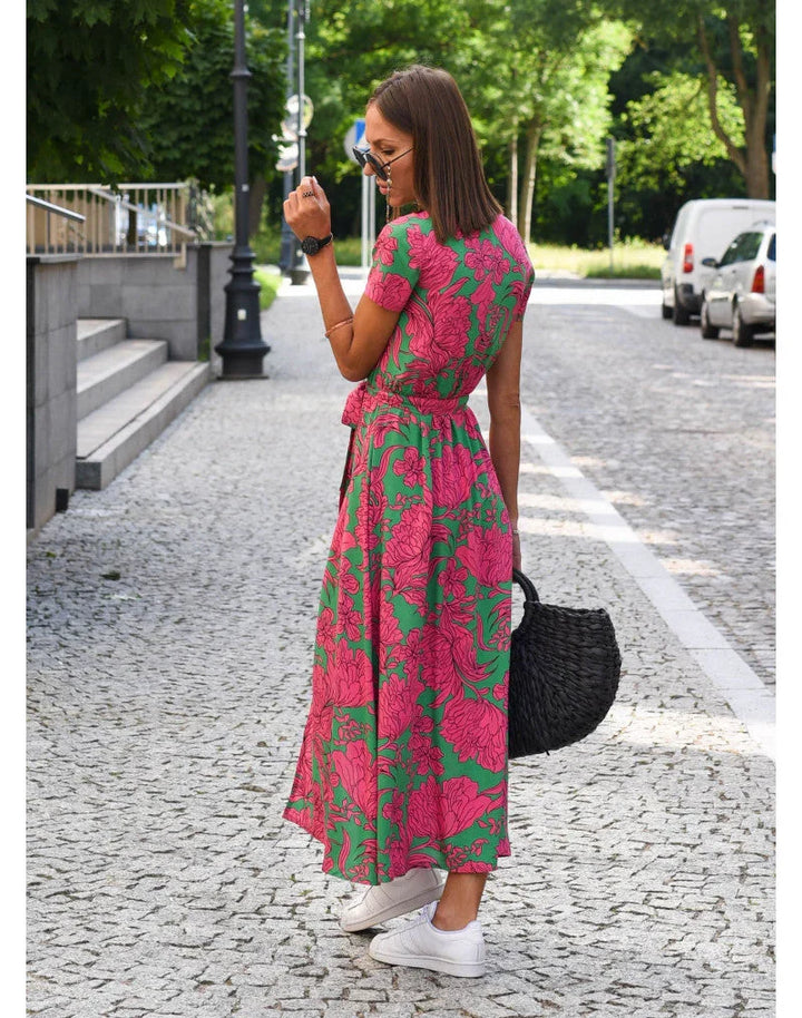 Elegant women's floral V-neck maxi dress with a relaxed fit, perfect as a casual summer dress or vacation wear.
