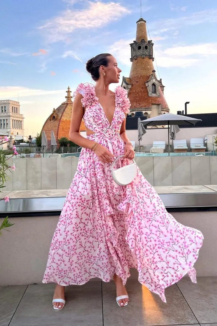Beautiful floral print maxi dress for women, featuring a stylish ruffle V-neck. Ideal for wedding guests.
