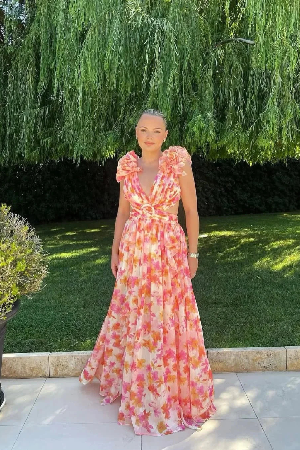 Elegant women's wedding guest floral maxi dress, featuring a flowy design & ruffle V-neck.