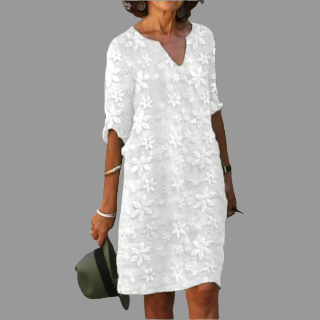 Women's elegant floral midi dress with V-neck & half sleeves, perfect for summer casual or occasion wear. Plus sizes.