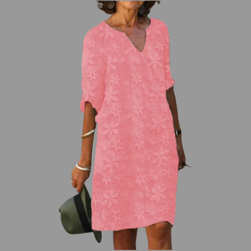 Stylish women's floral midi dress for summer. Features a flattering V-neck, half sleeves, and elegant everyday design.