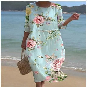 Women's elegant floral midi dress with vibrant botanical print, perfect for versatile summer and spring fashion.