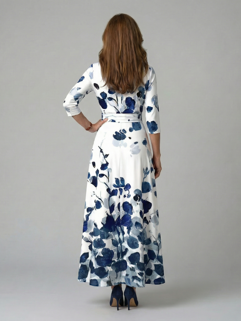 Elegant women's midi dress, floral pattern, cross V-neck, 3/4 sleeves, defined waist for a chic silhouette.