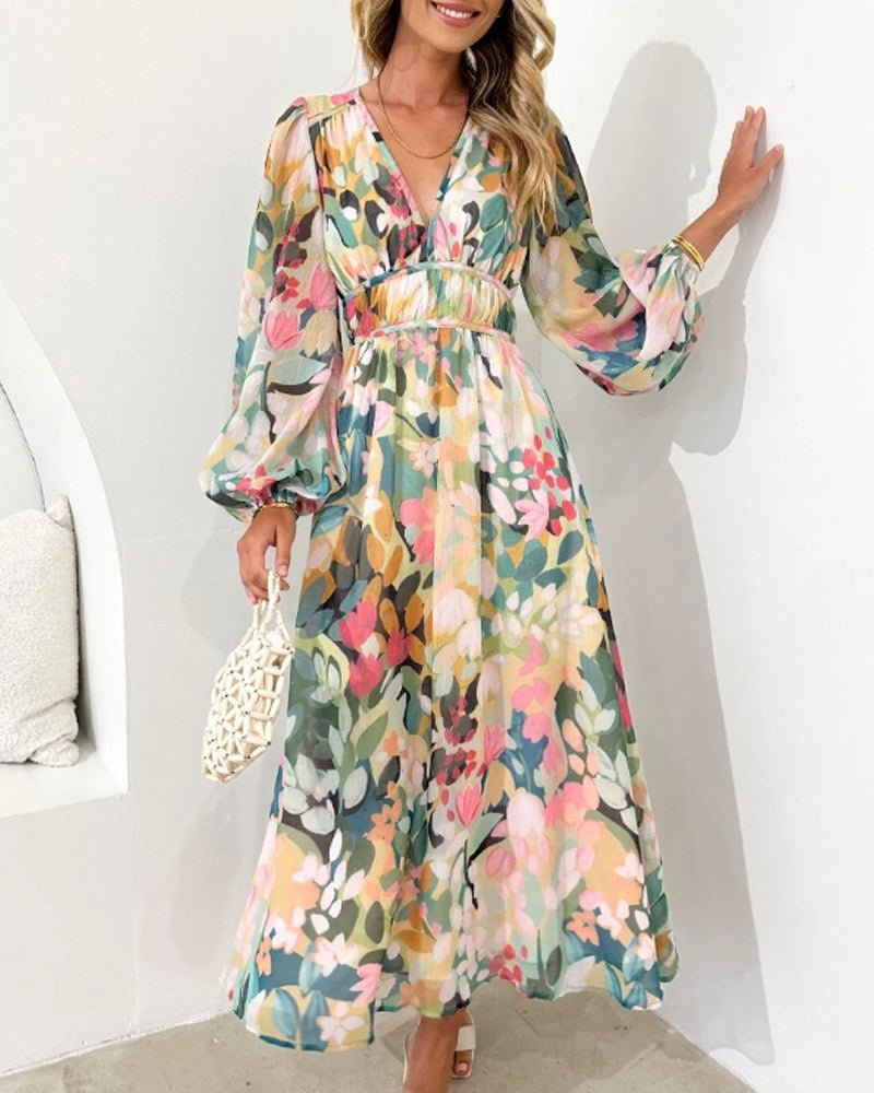 Romantic women's floral midi dress featuring chic puff sleeves & a stylish V-neck, ideal for elegant summer wear.
