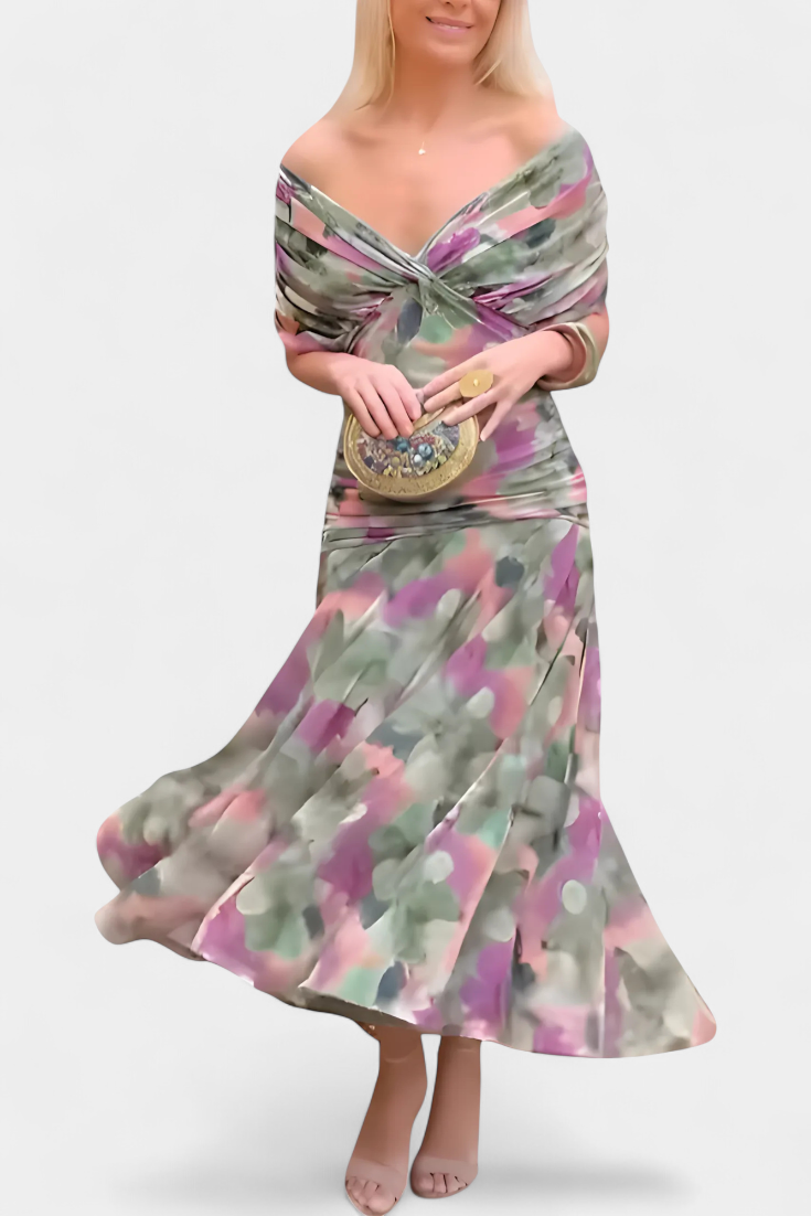 Women's elegant maxi dress, floral pattern, V-neck, and a beautiful flowy drape.