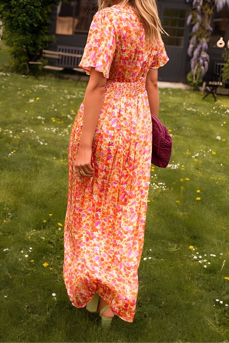 Vibrant floral print V-neck short-sleeve maxi dress, exuding effortless elegance for women's summer events.