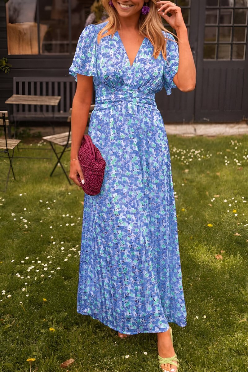 Chic women's summer floral maxi dress with short sleeves & a V-neck, great for vacation outfits.