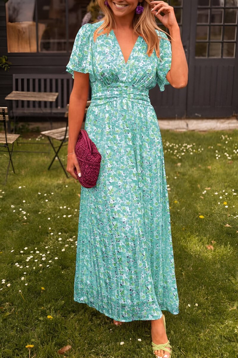Versatile women's floral maxi dress: V-neck, short sleeves, & elegant design, suitable for casual to party wear.