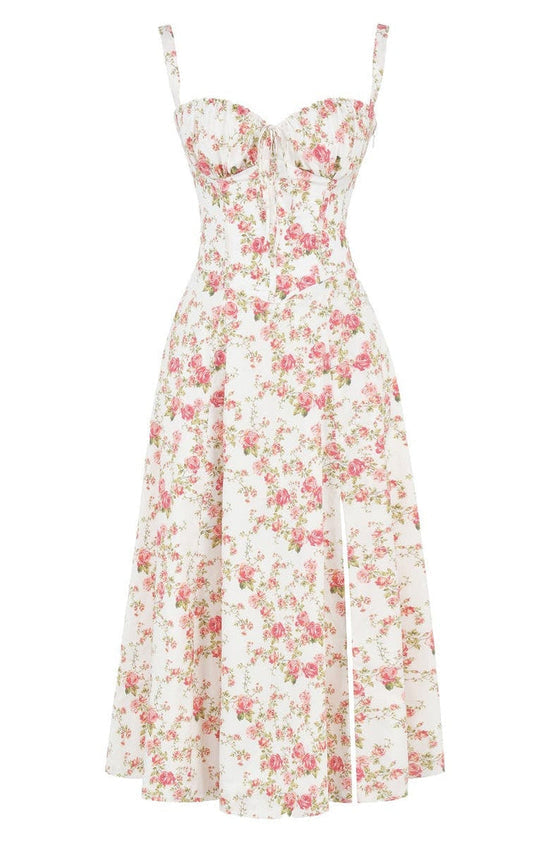 Figure-flattering women's floral sundress with waist-shaping design. Elegant summer occasion wear.