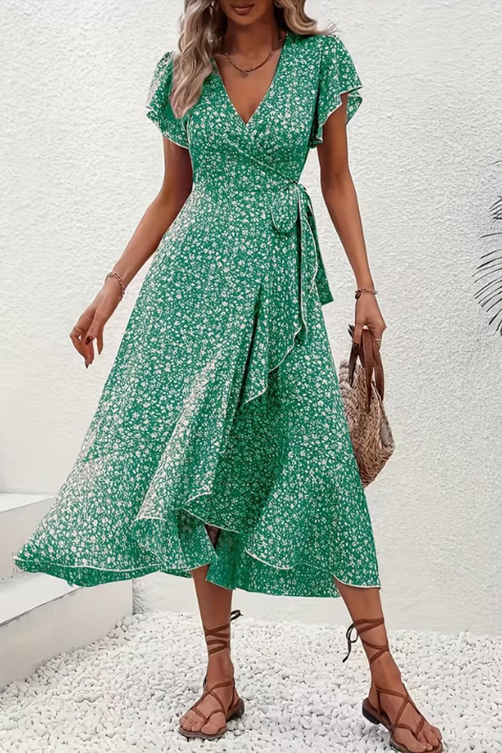 Women's holiday floral midi dress, a comfortable wrap style with a chic asymmetric hem.
