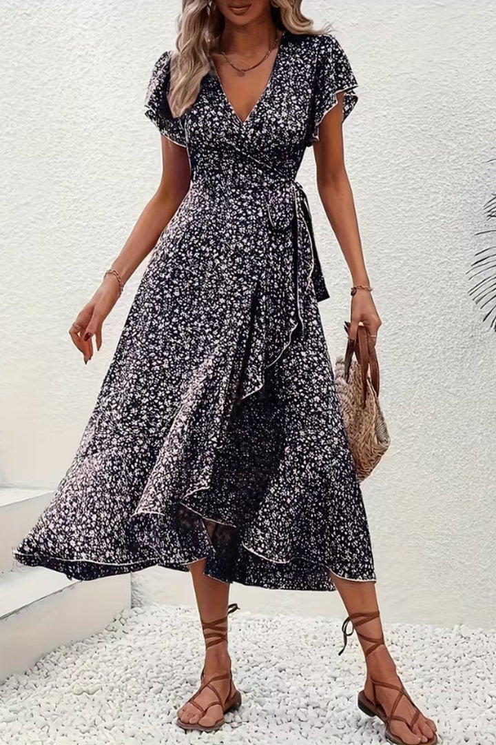 Feminine floral wrap midi dress, an elegant women's gown with a flattering V-neck.