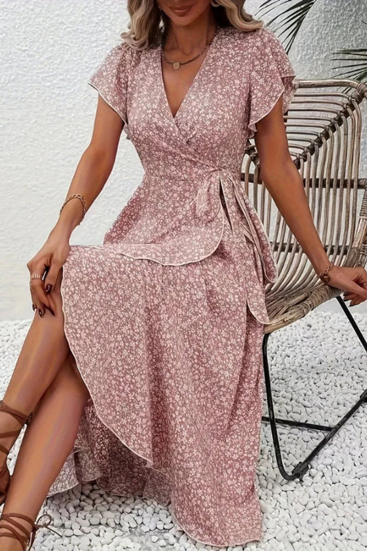 Women's elegant floral print midi dress, a versatile wrap style for party or casual wear.
