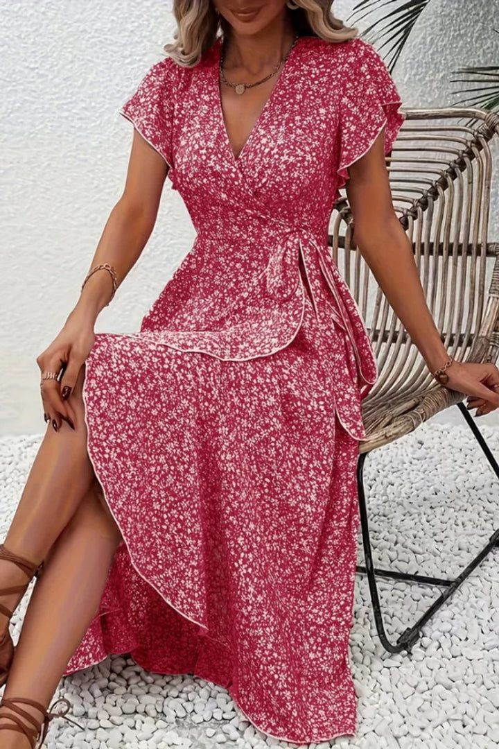 Boho chic floral wrap midi dress, a charming V-neck gown with flutter sleeves for women.
