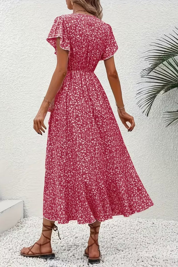 Elegant women's floral midi wrap dress, ideal for a wedding guest or special holiday.