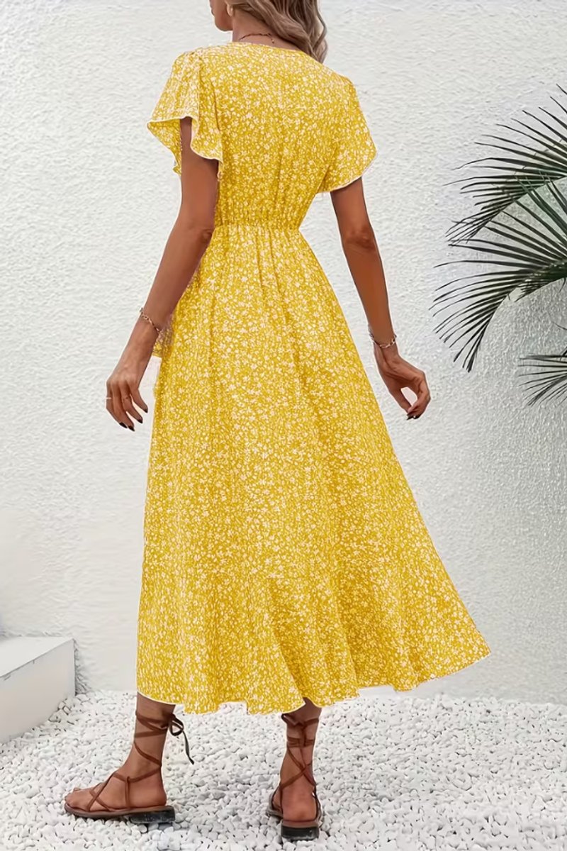Vibrant floral boho wrap midi dress, featuring a V-neck and asymmetric hem for women.