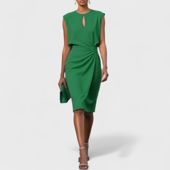 Elegant women's midi dress showcasing graceful flowing fabric. Perfect for formal events & parties.