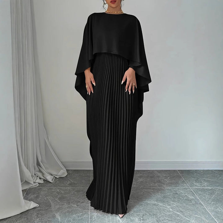 Flowy pleated batwing sleeve maxi dress for women. Elegant long autumn dress, ideal for special occasions.