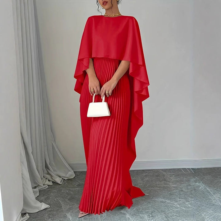 Elegant women's pleated batwing maxi dress. Flowing design ideal for evening wear, autumn fashion, or special occasions.