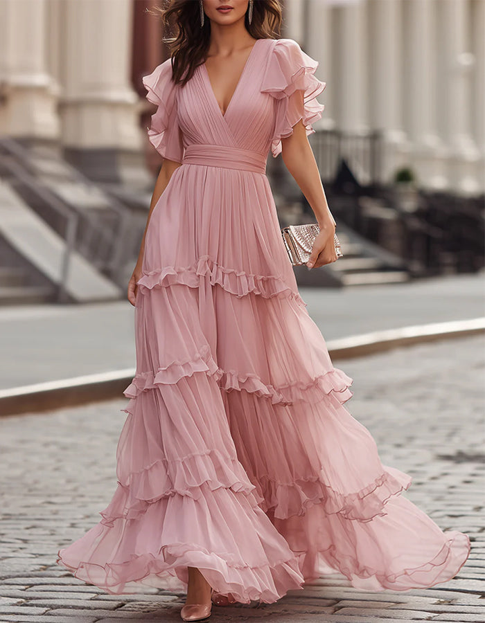 Women's elegant flowing ruffled hem maxi dress, perfect for wedding guests & formal events.
