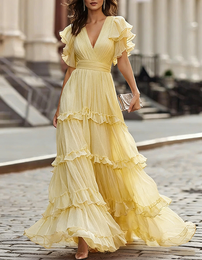 Women's formal V-neck maxi dress with a flowing silhouette and charming ruffled hem.