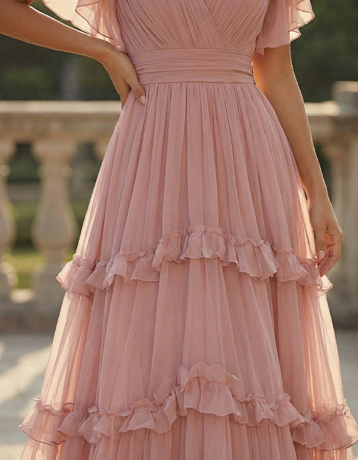 Elegant formal maxi dress with subtle ruffled hem, perfect for evening wear & sophisticated events.