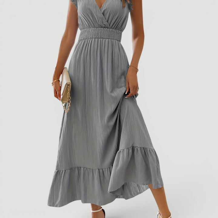 Women's elegant V-neck flowy maxi dress, comfortable & chic for summer evening parties & vacation.