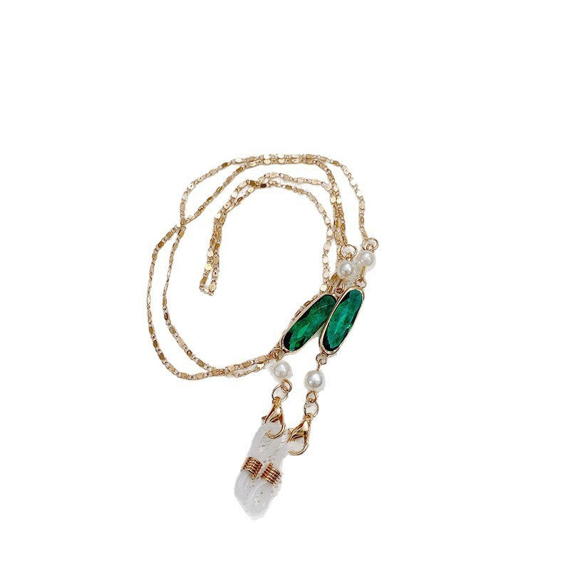 Sparkling women's elegant gemstone and pearl pendant necklace, premium fashion jewelry accessory.