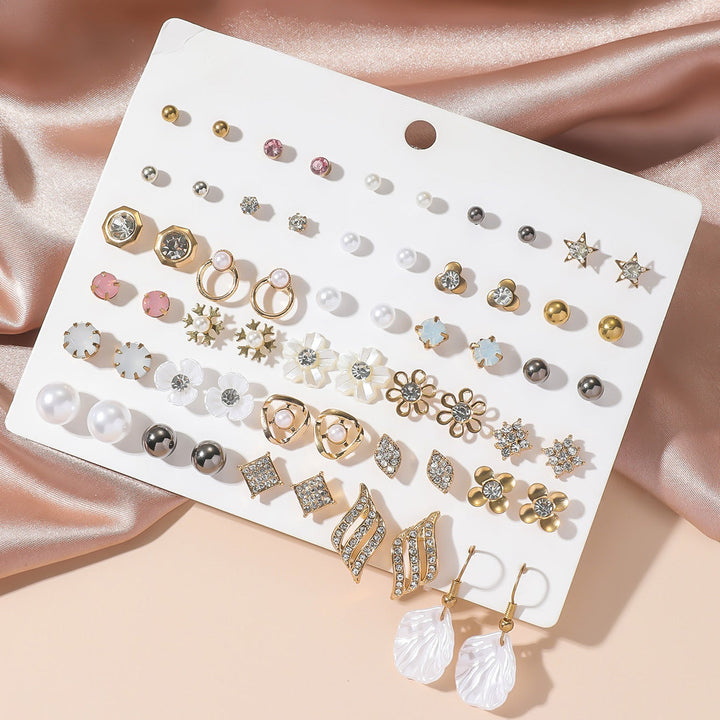 Women's exquisite gold accent earring set, elegant and versatile jewelry for any fashion occasion.