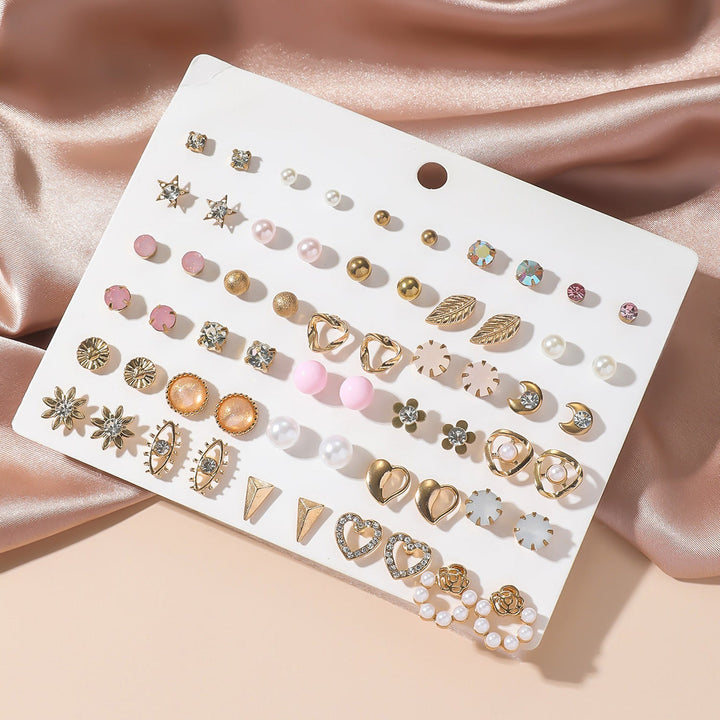 Stylish women's gold earrings, a versatile rhinestone jewelry set for contemporary elegance.