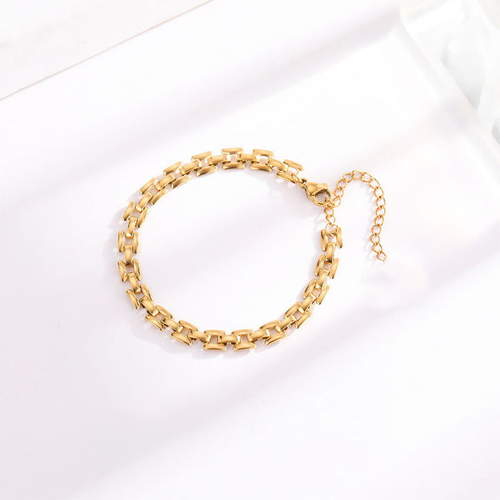 Classic women's gold link chain bracelet, a timeless elegant accessory for sophisticated style.