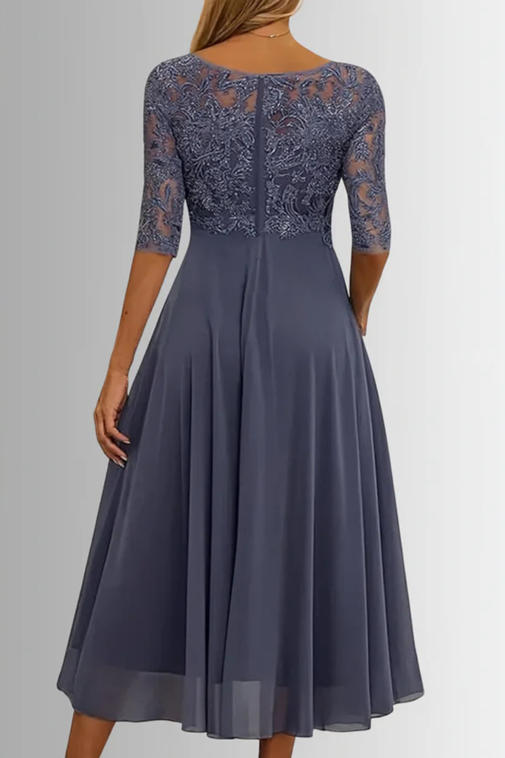 Beautiful women's bodice half sleeve midi dress, ideal for weddings, guests & formal events.