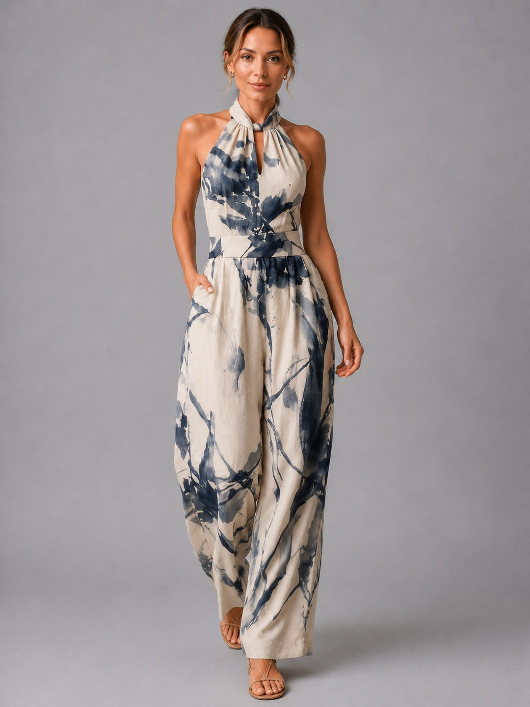 Women's elegant halterneck wide-leg jumpsuit, perfect for summer fashion & vacation wear. Comfortable & stylish.