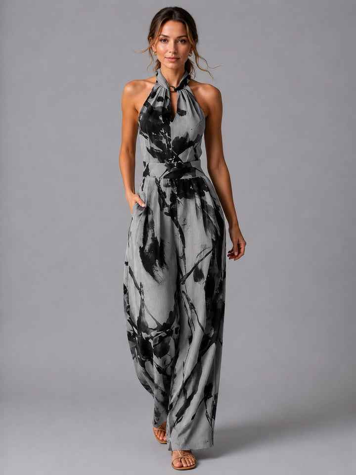 Effortless women's wide-leg halterneck jumpsuit, a comfortable & elegant choice for summer fashion & travel.