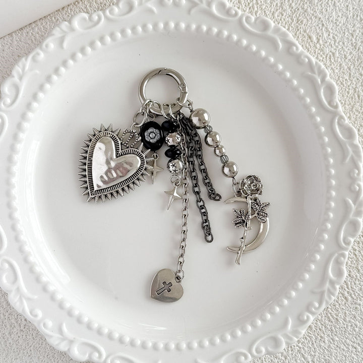Stylish women's floral heart bag charm keychain, an elegant accessory & gift for keys.
