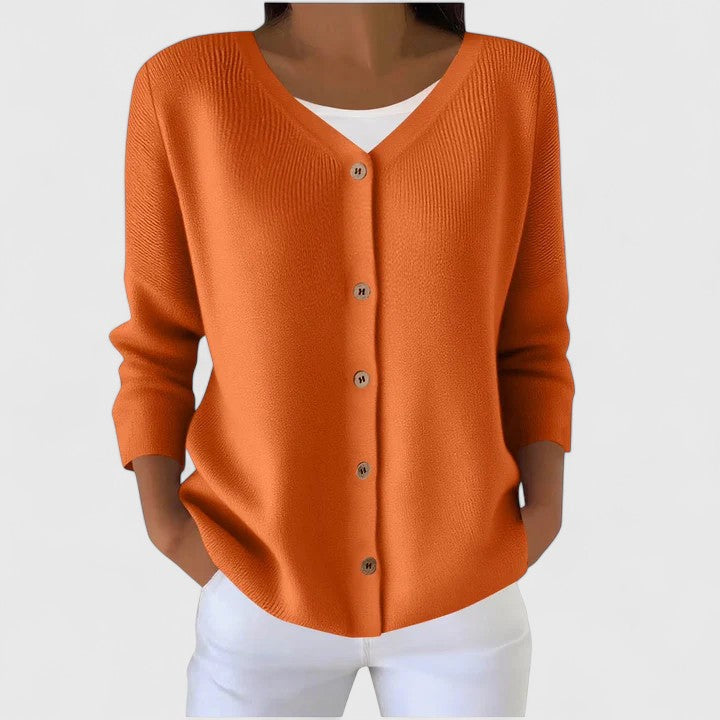 Soft, long sleeve women's hooded cardigan, an elegant and cozy layer for any season.