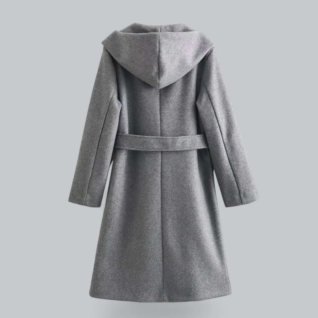 Luxurious women's hooded long trench coat, a refined choice for elegant outerwear.