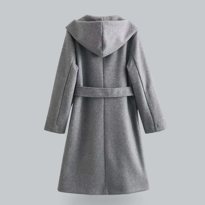Luxurious women's hooded long trench coat, a refined choice for elegant outerwear.