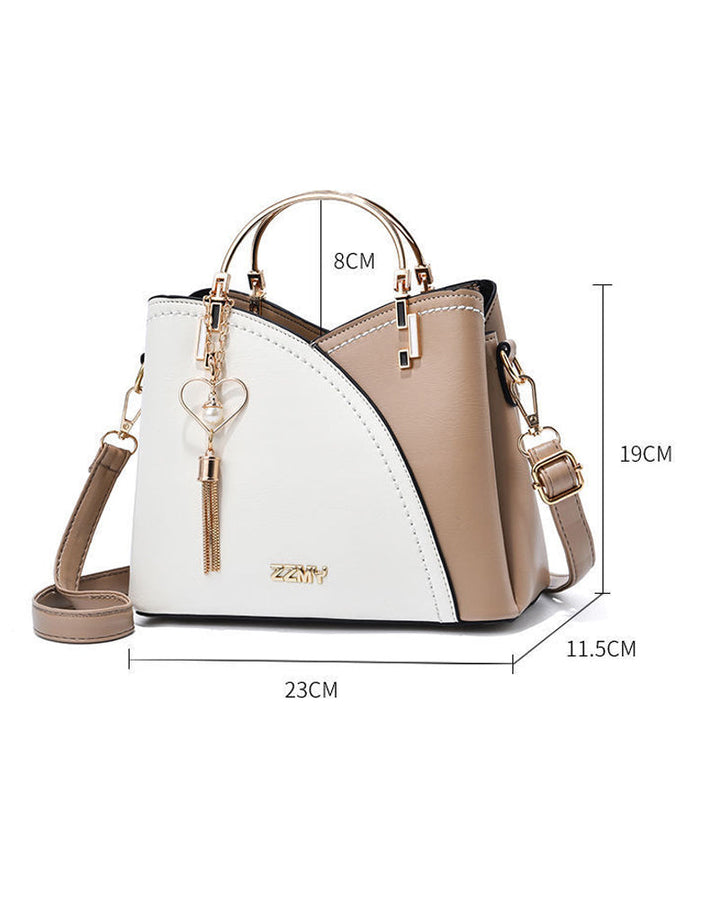 Modern women's PU leather tote, multi-pocket design, adjustable shoulder & crossbody strap.