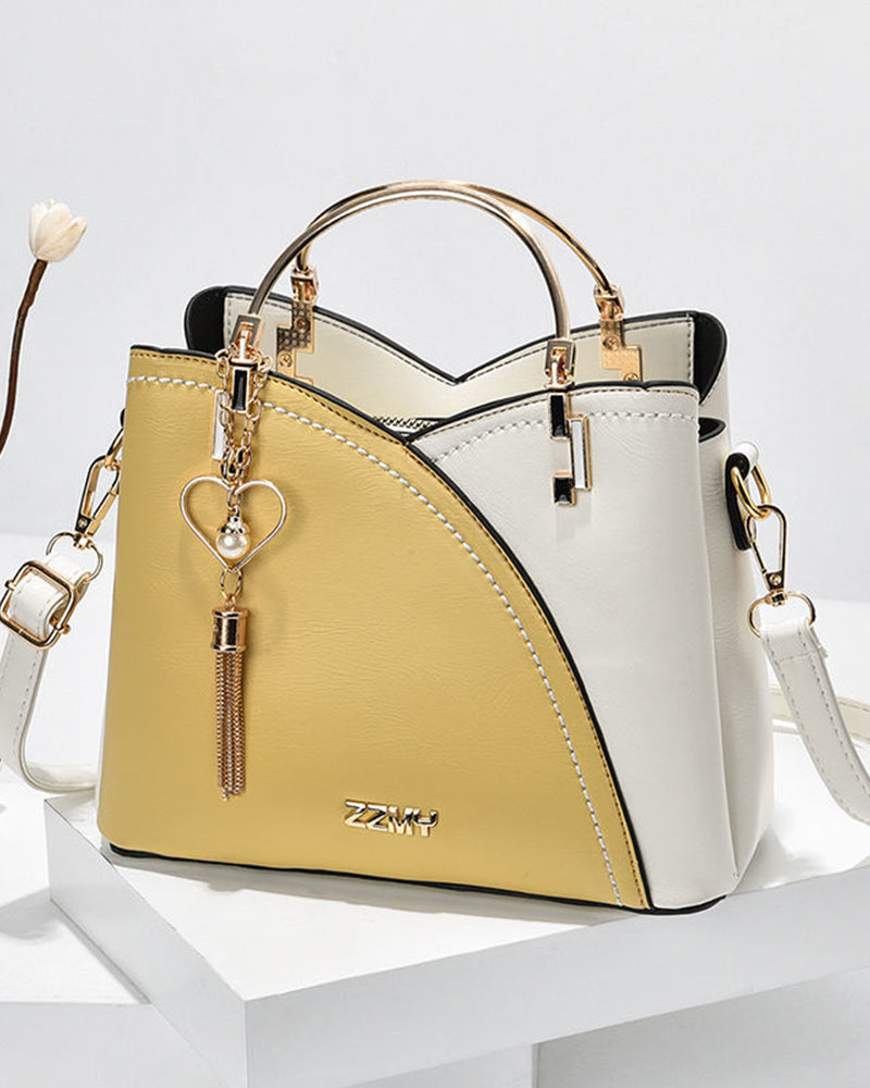 Fashionable PU leather tote for women, large capacity & multi-pocket organizer, adjustable strap.