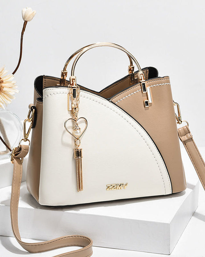 Everyday women's PU leather shoulder bag, roomy with adjustable strap for comfort.