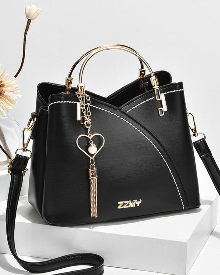 Versatile PU leather women's tote, elegant design, adjustable shoulder & crossbody strap.