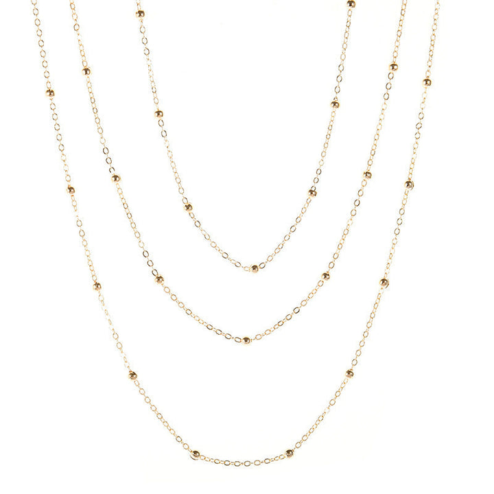 Multi-layered beaded chain necklace for women, a chic and versatile jewelry accessory.