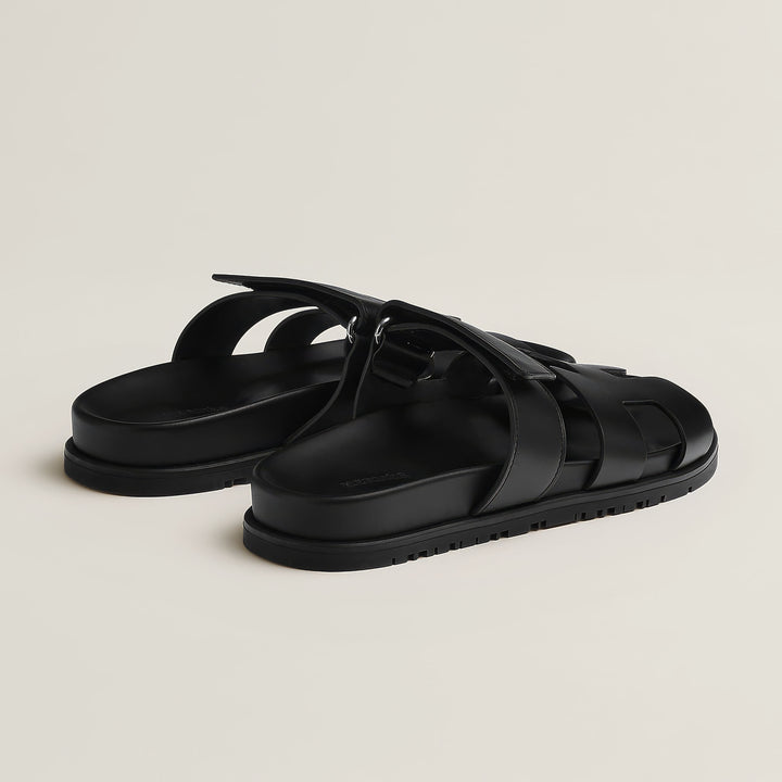 Side view of women's elegant strap sandals, showcasing their sleek profile and comfort design.