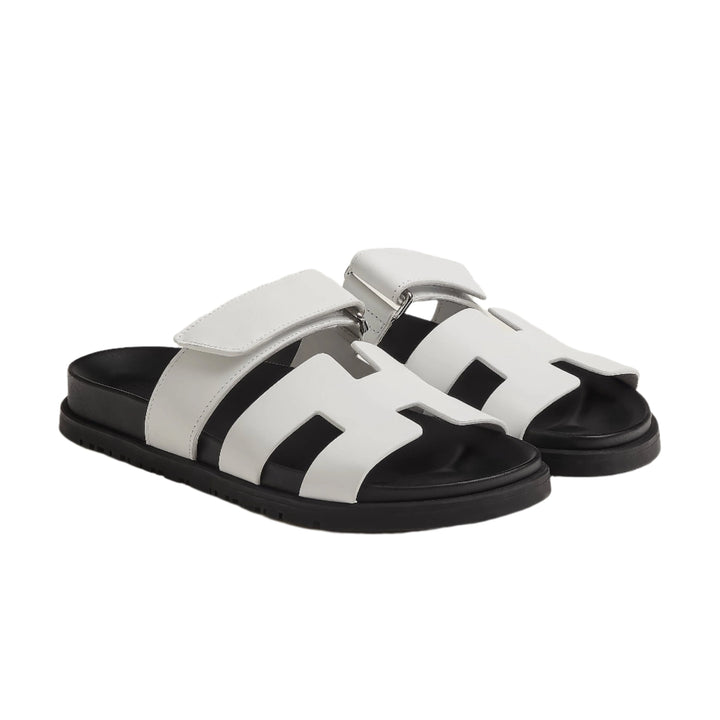 Chic women's adjustable leather sandals offering all-day comfort & minimalist summer style.